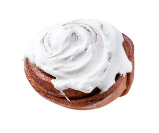 Photo of Tasty cinnamon roll with cream isolated on white