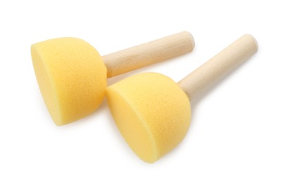 Photo of Two sponges for face painting isolated on white, top view