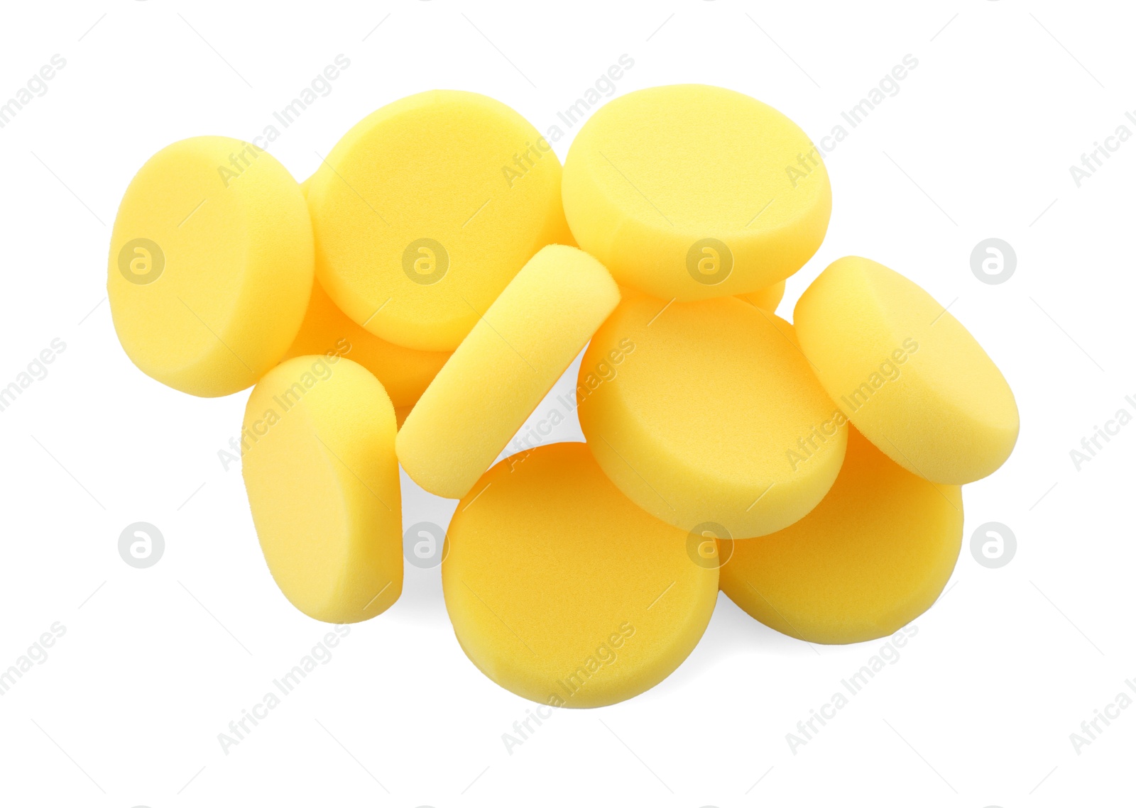 Photo of Yellow sponges for face painting isolated on white, top view