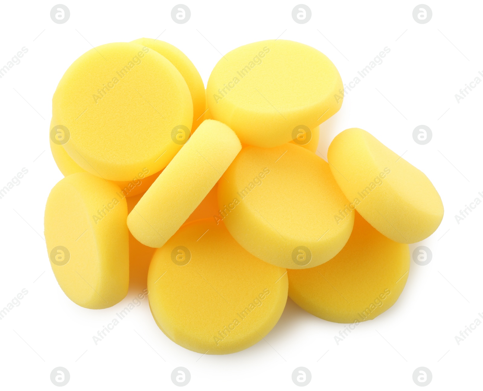 Photo of Yellow sponges for face painting isolated on white, top view