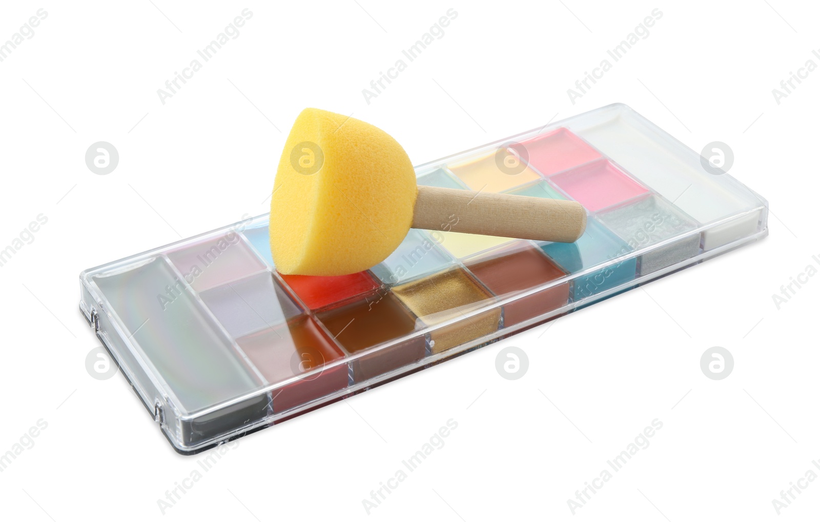 Photo of Bright face paint palette and sponge isolated on white