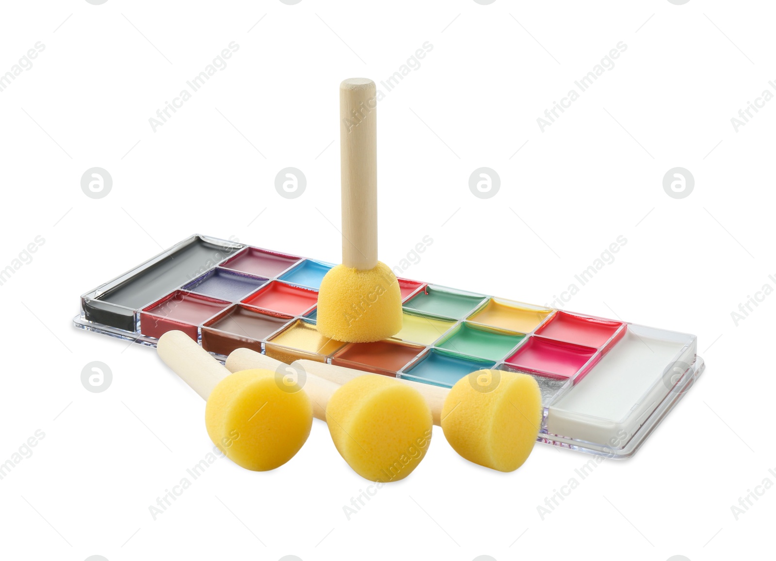 Photo of Bright face paint palette and sponges isolated on white