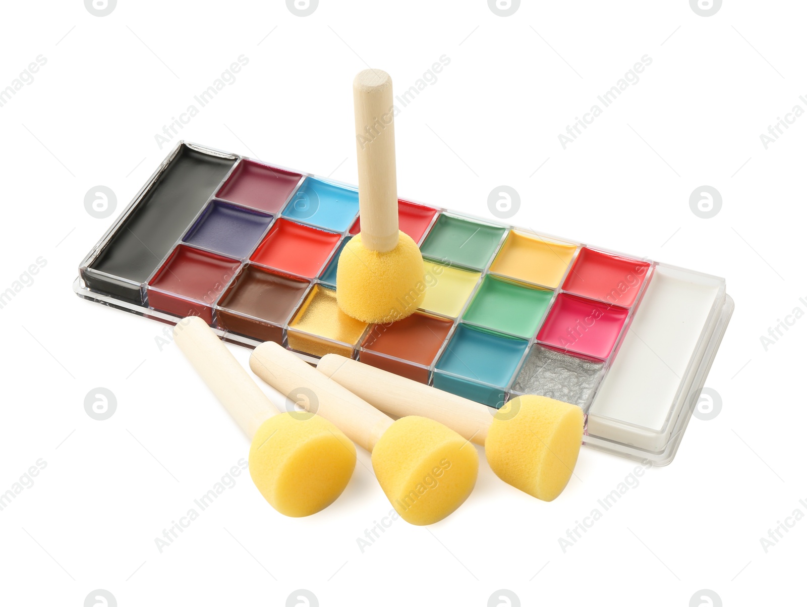 Photo of Bright face paint palette and sponges isolated on white