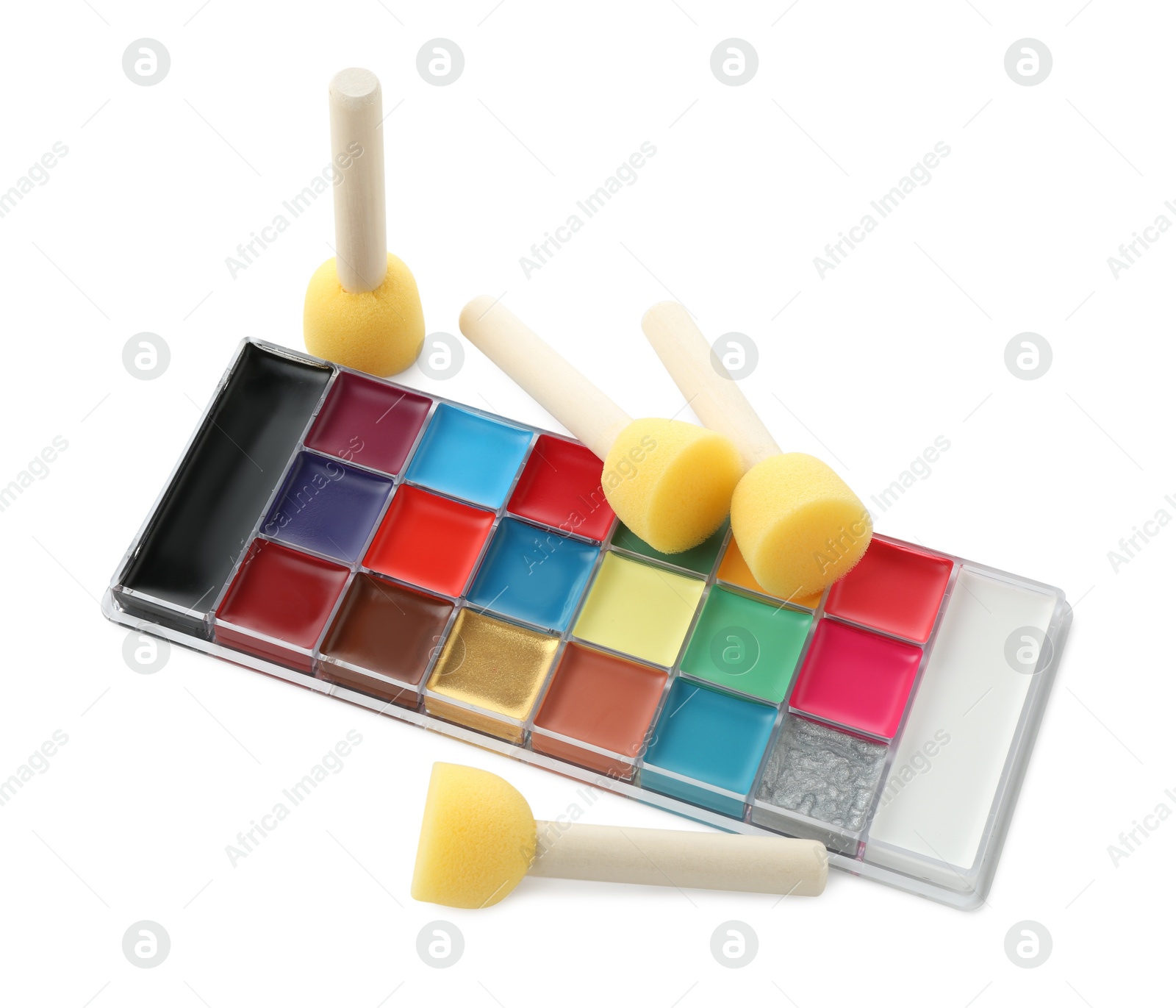 Photo of Bright face paint palette and sponges isolated on white