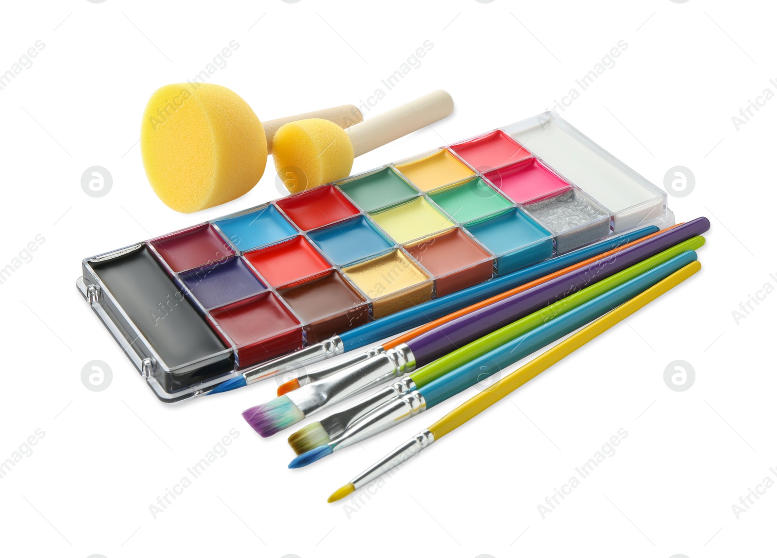 Photo of Bright face paint palette, brushes and sponges isolated on white