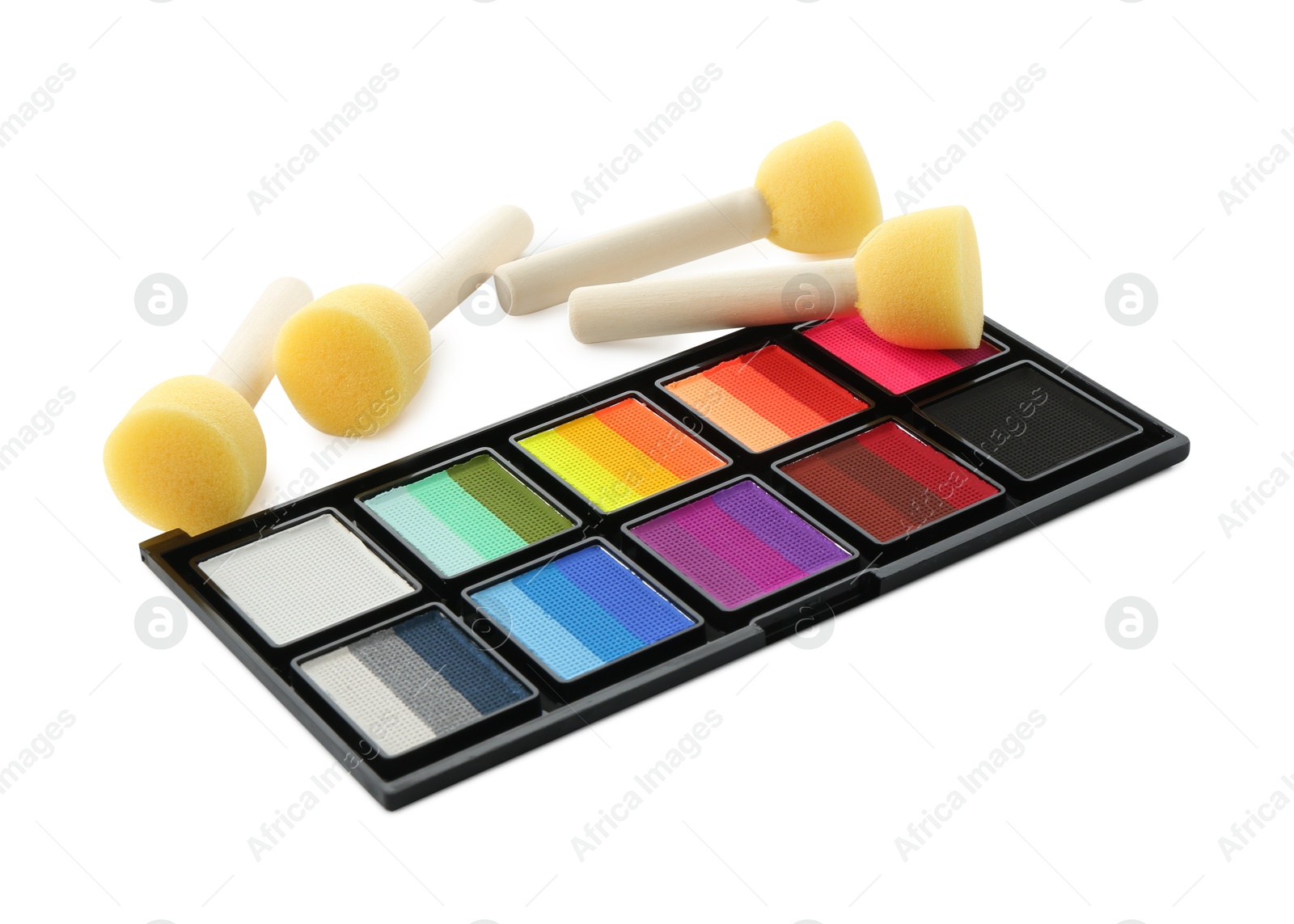 Photo of Bright face paint palette and sponges isolated on white