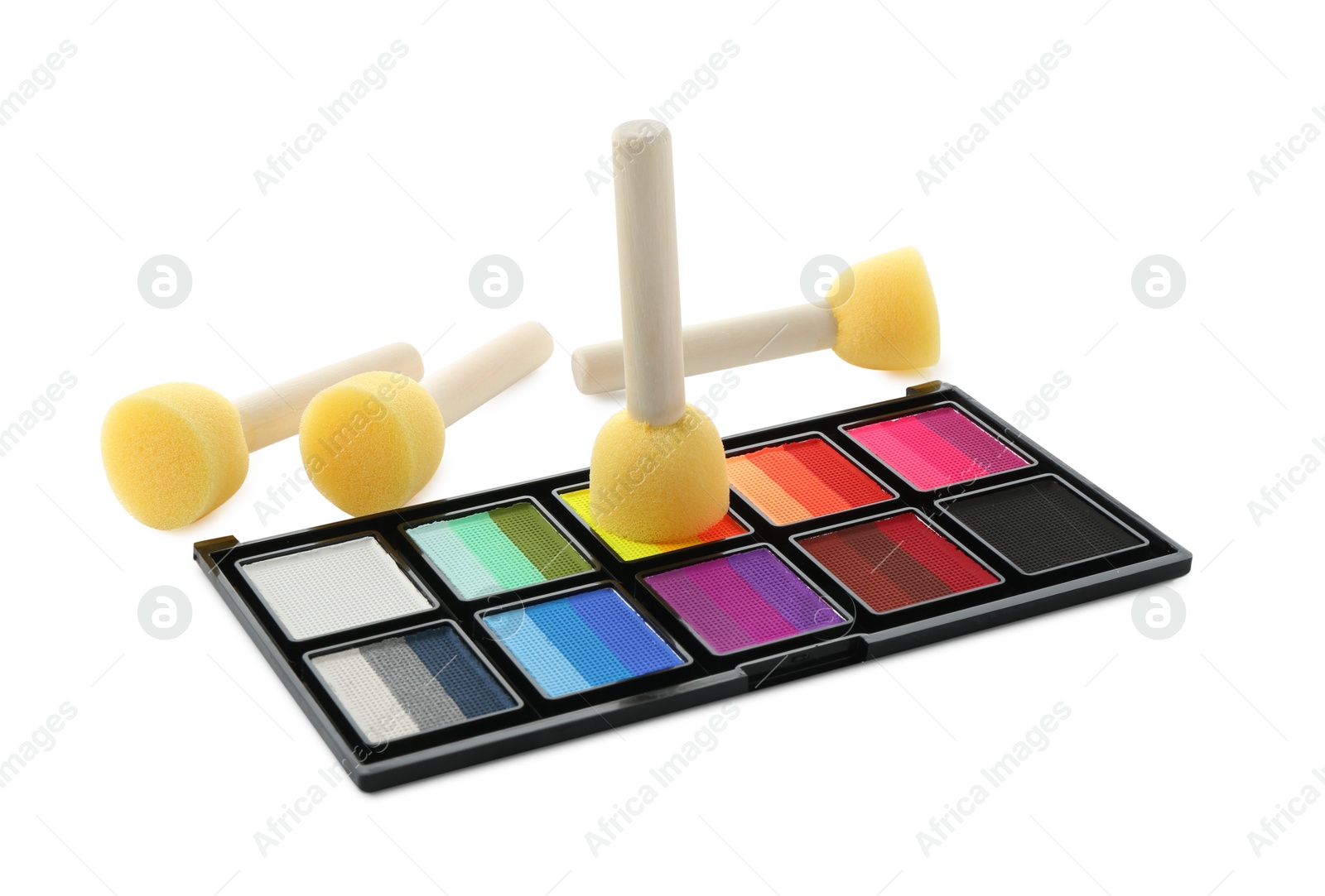 Photo of Bright face paint palette and sponges isolated on white