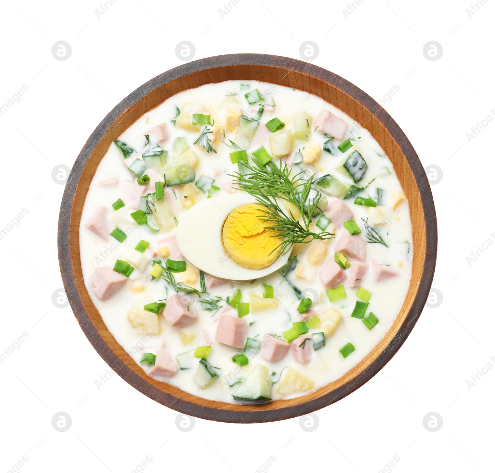 Photo of Delicious okroshka soup with kefir in bowl isolated on white, top view