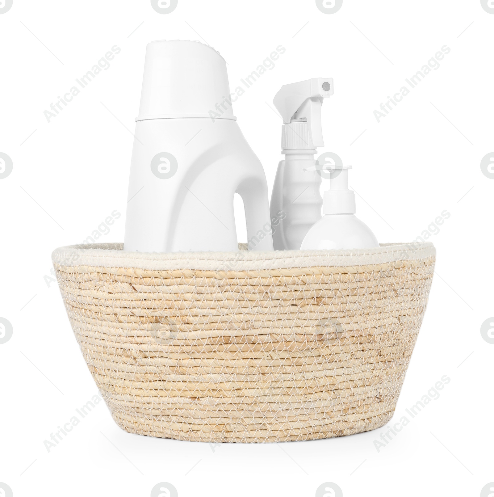 Photo of Different cleaning products in wicker basket isolated on white