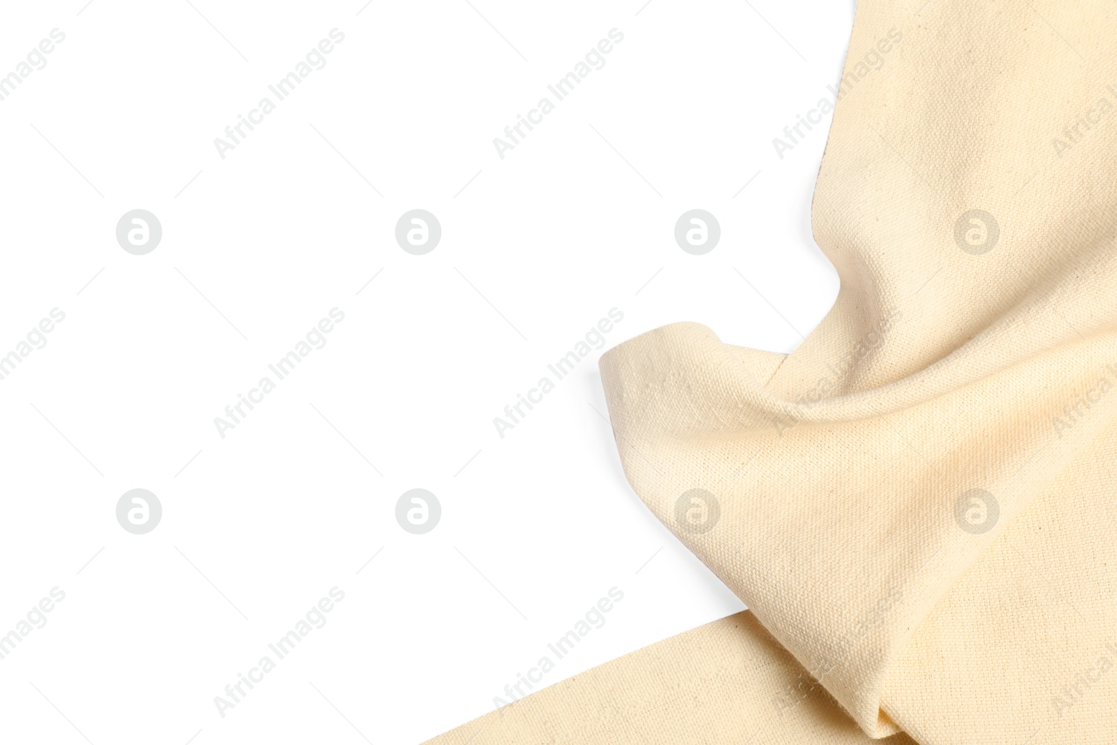 Photo of Beige tablecloth isolated on white, top view