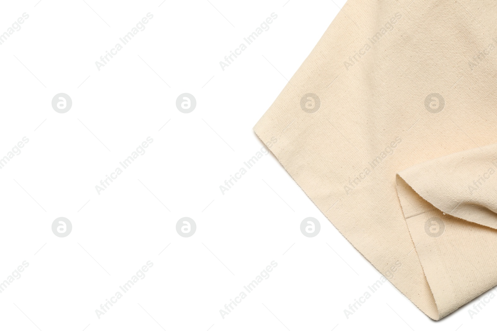 Photo of Beige tablecloth isolated on white, top view