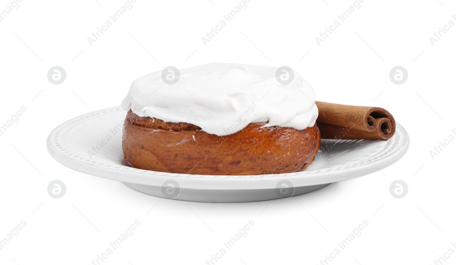 Photo of Tasty cinnamon roll with cream and stick isolated on white