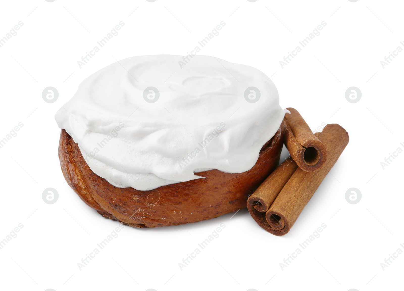 Photo of Tasty cinnamon roll with cream and spices isolated on white