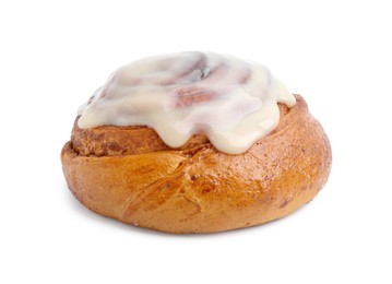 Photo of Tasty cinnamon roll with cream isolated on white