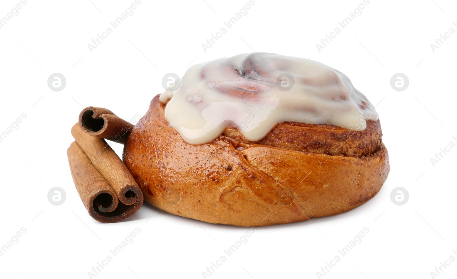 Photo of Tasty cinnamon roll with cream and spices isolated on white