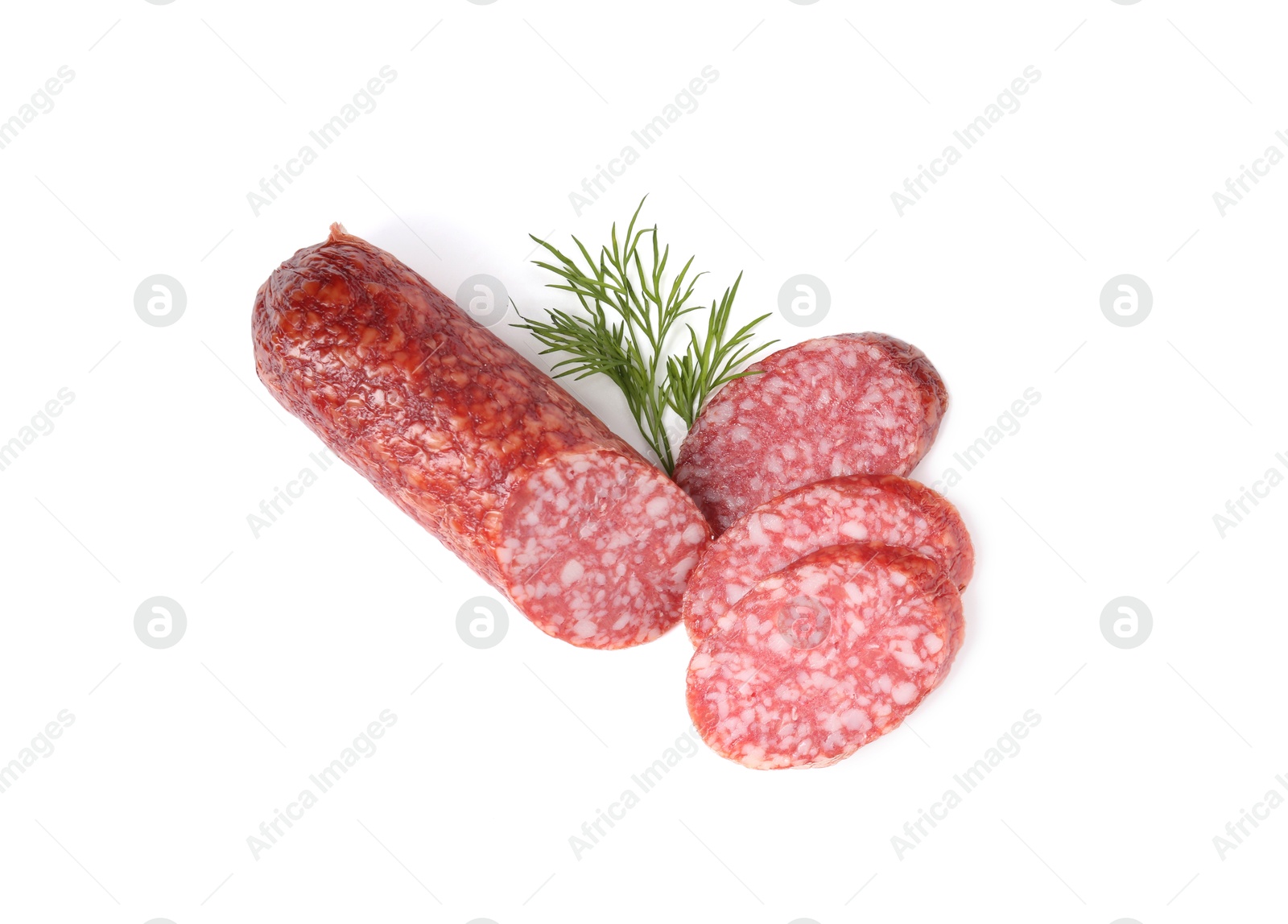 Photo of Pieces of delicious smoked sausage and dill isolated on white, top view