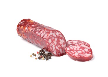 Photo of Delicious dry cured sausage and spices isolated on white