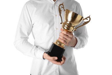 Man with golden trophy cup on white background, closeup