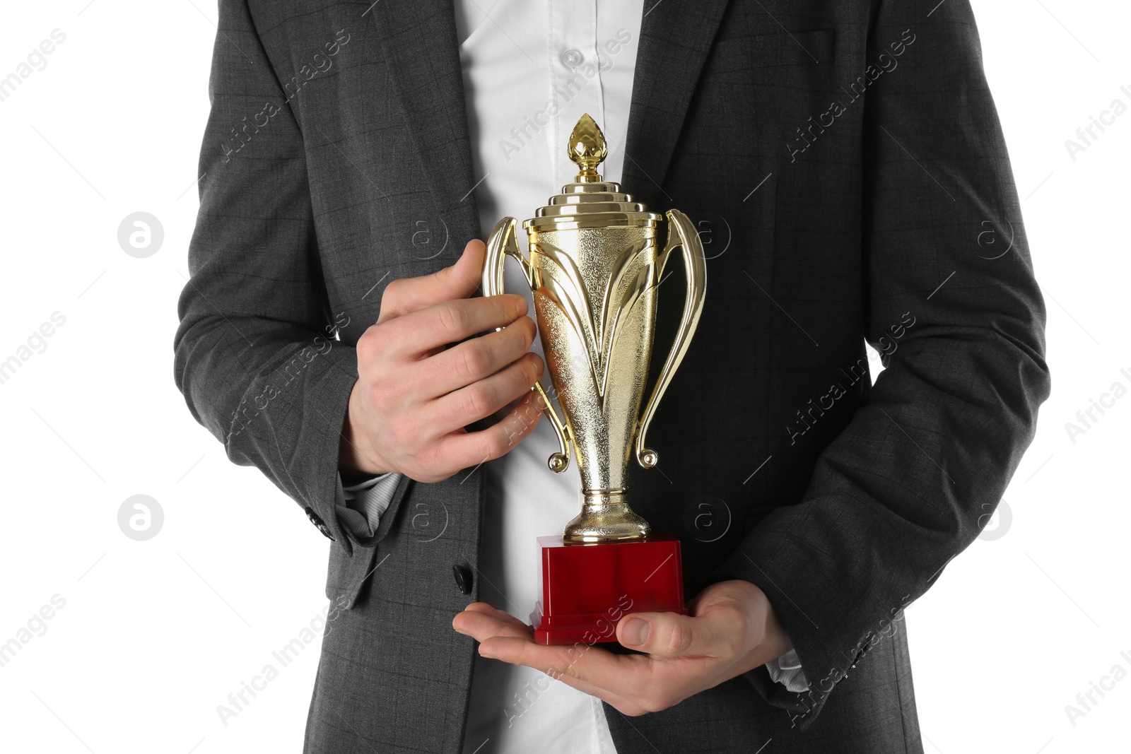 Photo of Man with golden trophy cup on white background, closeup