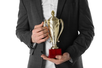 Photo of Man with golden trophy cup on white background, closeup