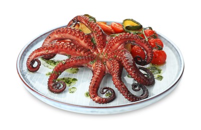 Photo of Fried octopus with herb sauce and vegetables isolated on white