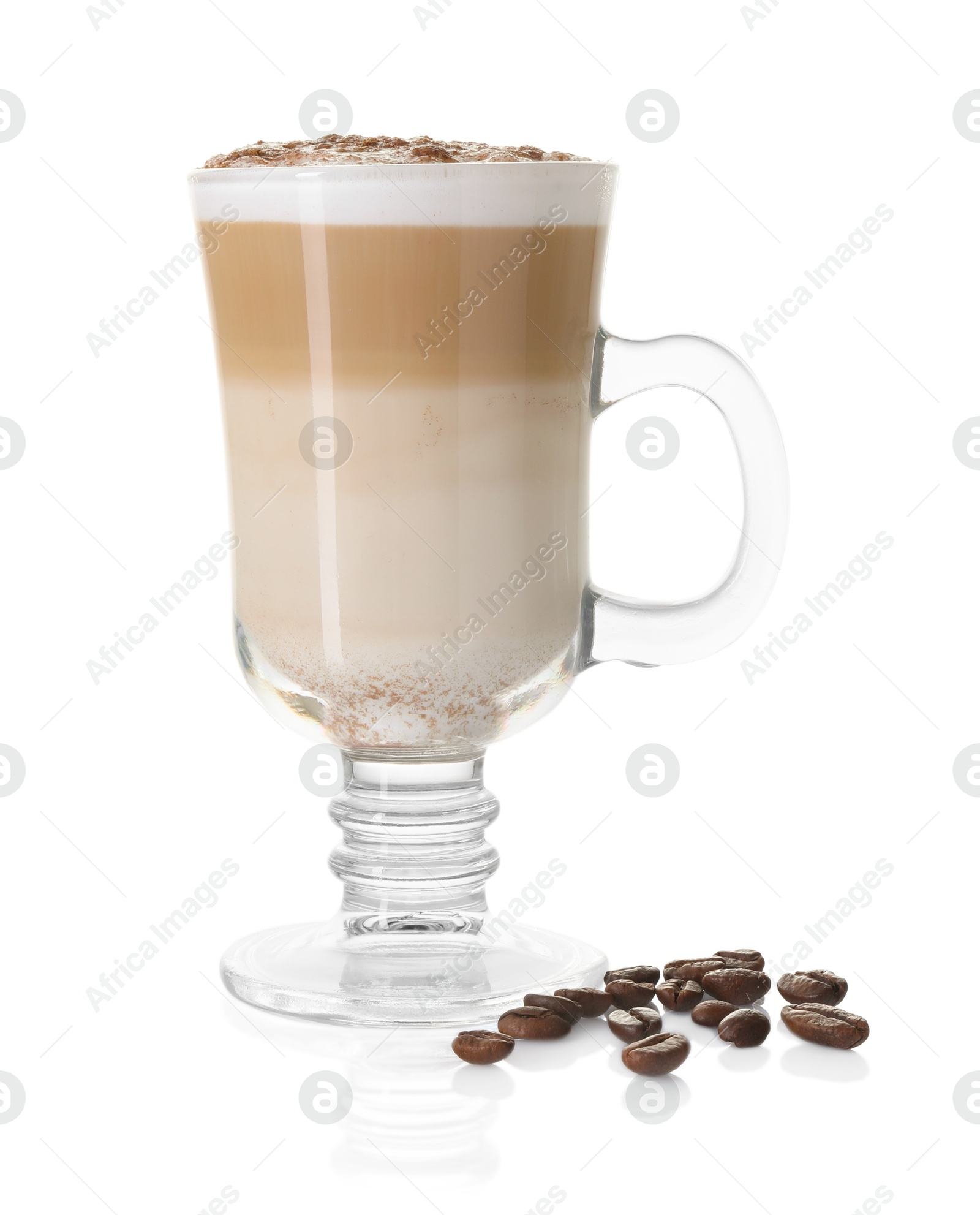 Photo of Tasty latte macchiato in glass cup and coffee beans isolated on white