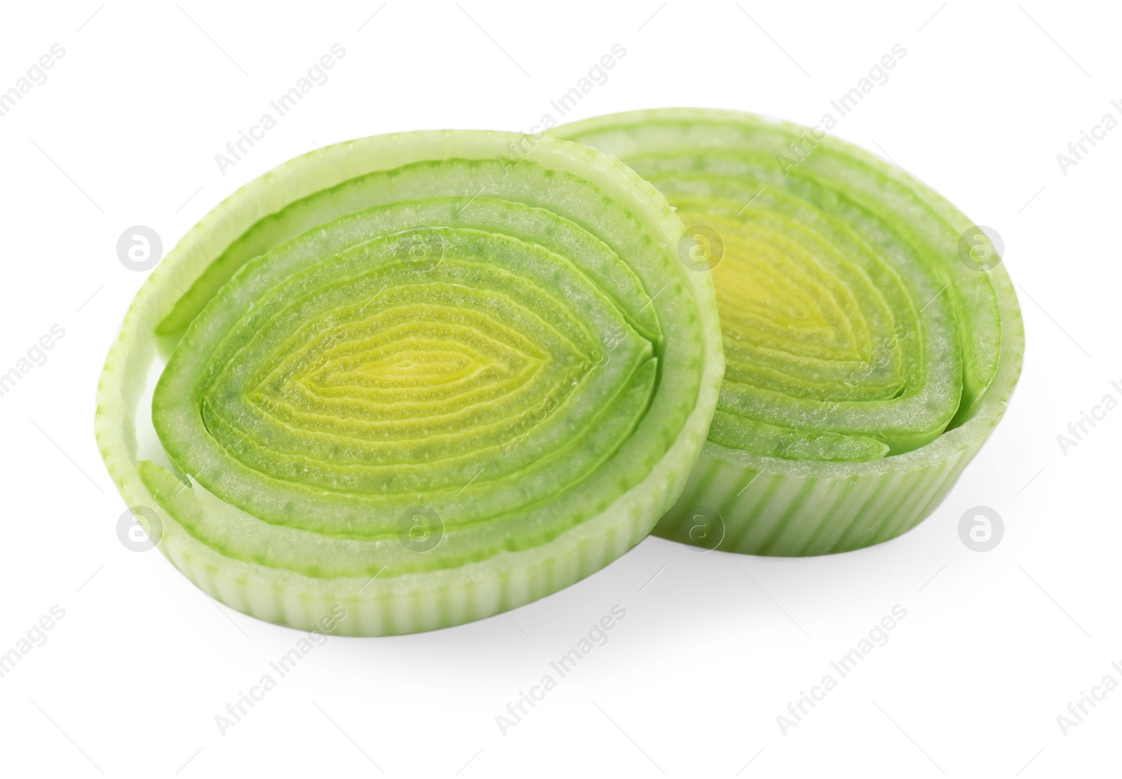 Photo of Pieces of chopped leek isolated on white