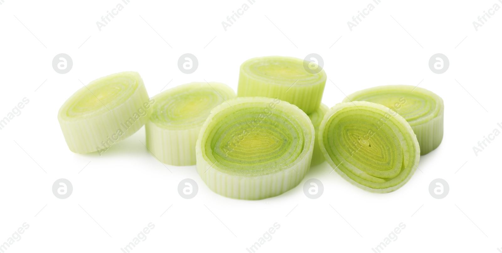 Photo of Pieces of chopped leek isolated on white