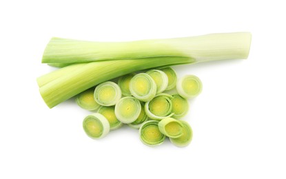 Photo of Whole and cut leeks isolated on white, top view