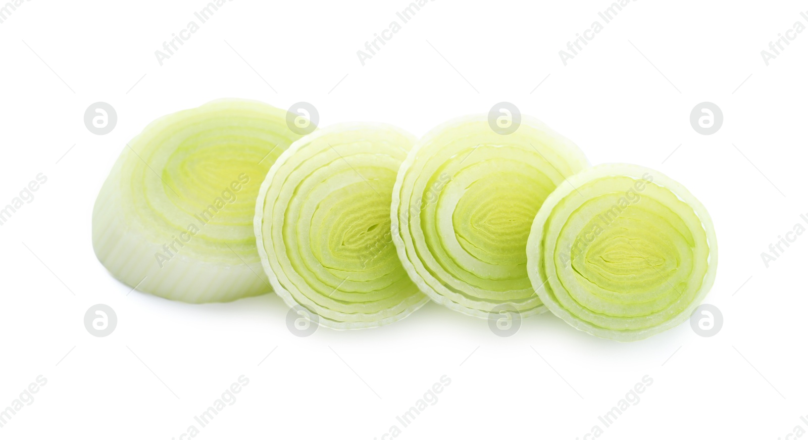 Photo of Pieces of fresh leek isolated on white