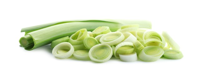 Photo of Whole and cut fresh leeks isolated on white