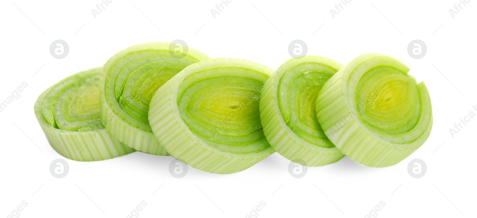 Photo of Pieces of chopped leek isolated on white