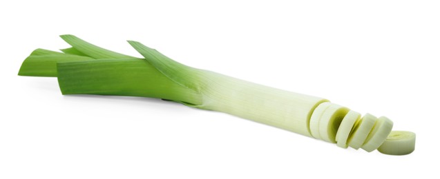 Photo of Fresh cut leek isolated on white. Spicy vegetable