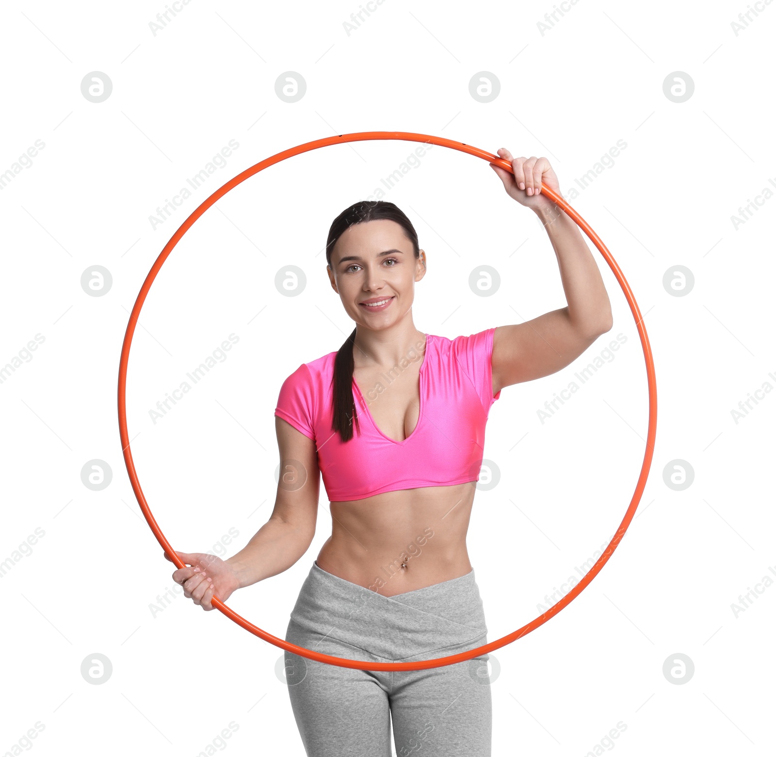 Photo of Smiling woman with hula hoop on white background