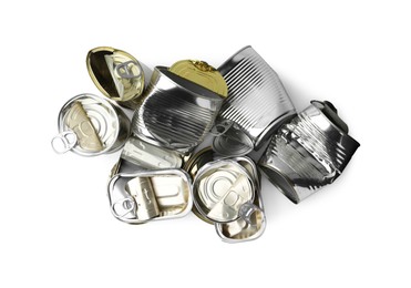 Photo of Many crumpled tin cans isolated on white, top view