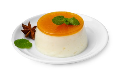 Photo of Tasty pudding with caramel sauce and mint isolated on white