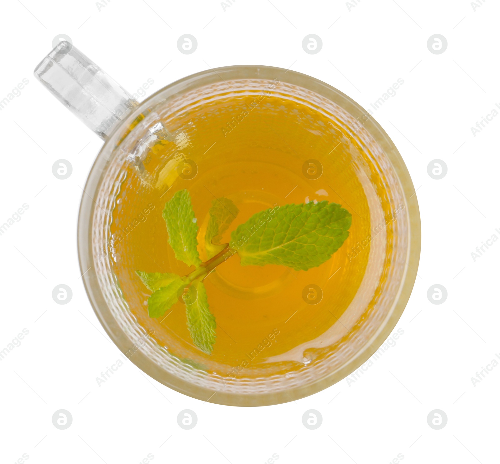 Photo of Aromatic mint tea and fresh leaves isolated on white