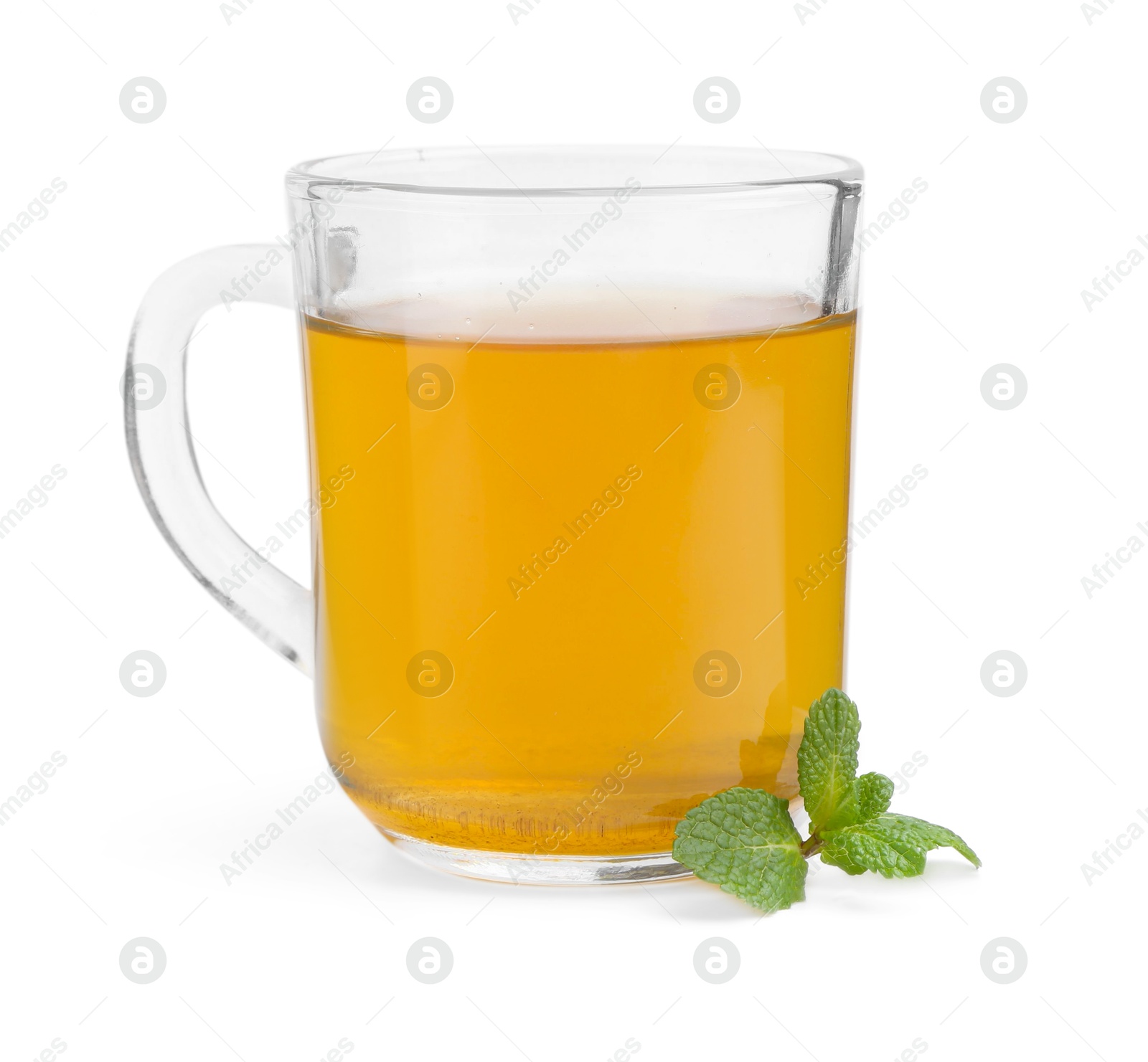 Photo of Aromatic mint tea and fresh leaves isolated on white