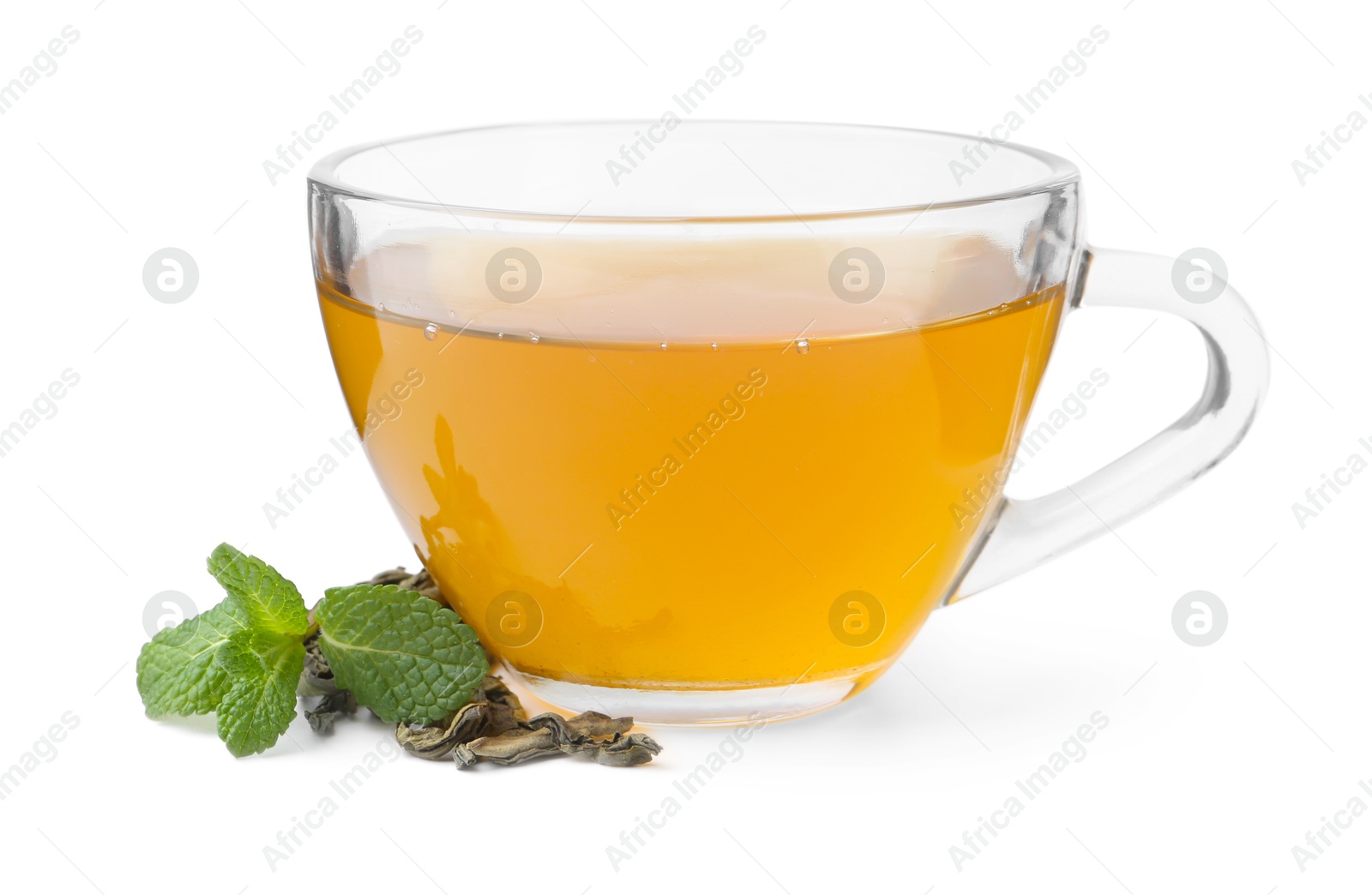 Photo of Aromatic mint tea, fresh and dried leaves isolated on white