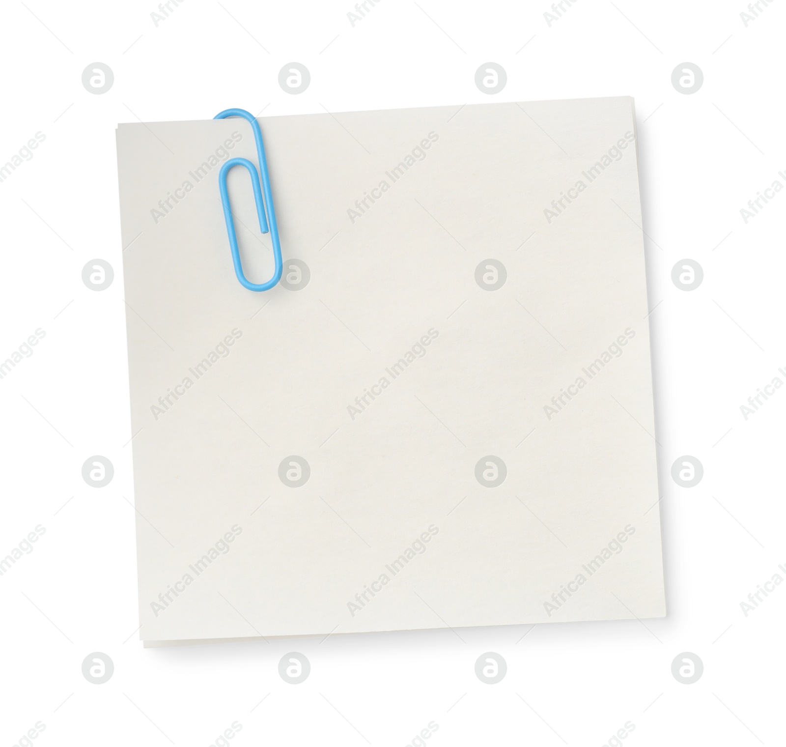 Photo of Blank paper note attached with clip isolated on white, top view