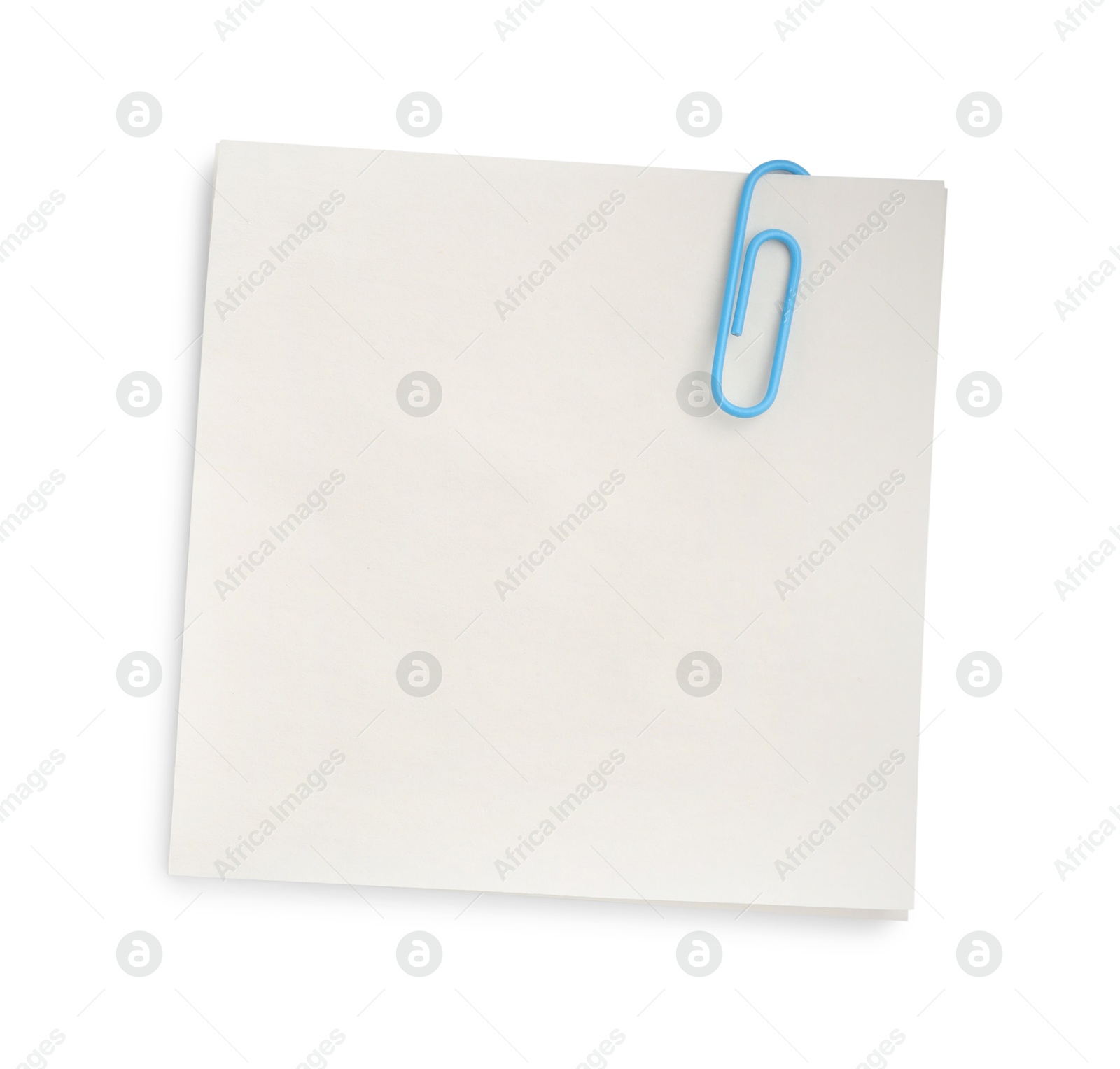 Photo of Blank paper note attached with clip isolated on white, top view