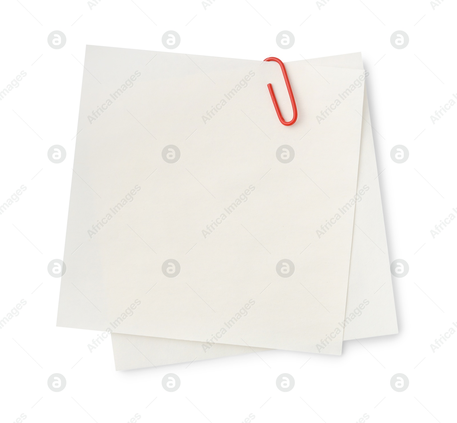 Photo of Blank paper notes attached with clip isolated on white, top view