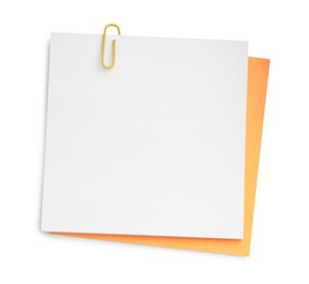 Photo of Blank paper notes attached with clip isolated on white, top view