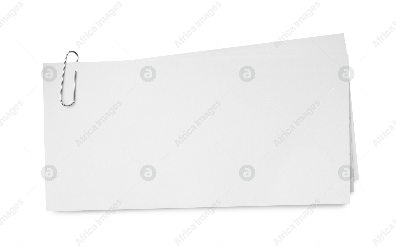 Photo of Blank paper sheet attached with clip isolated on white, top view