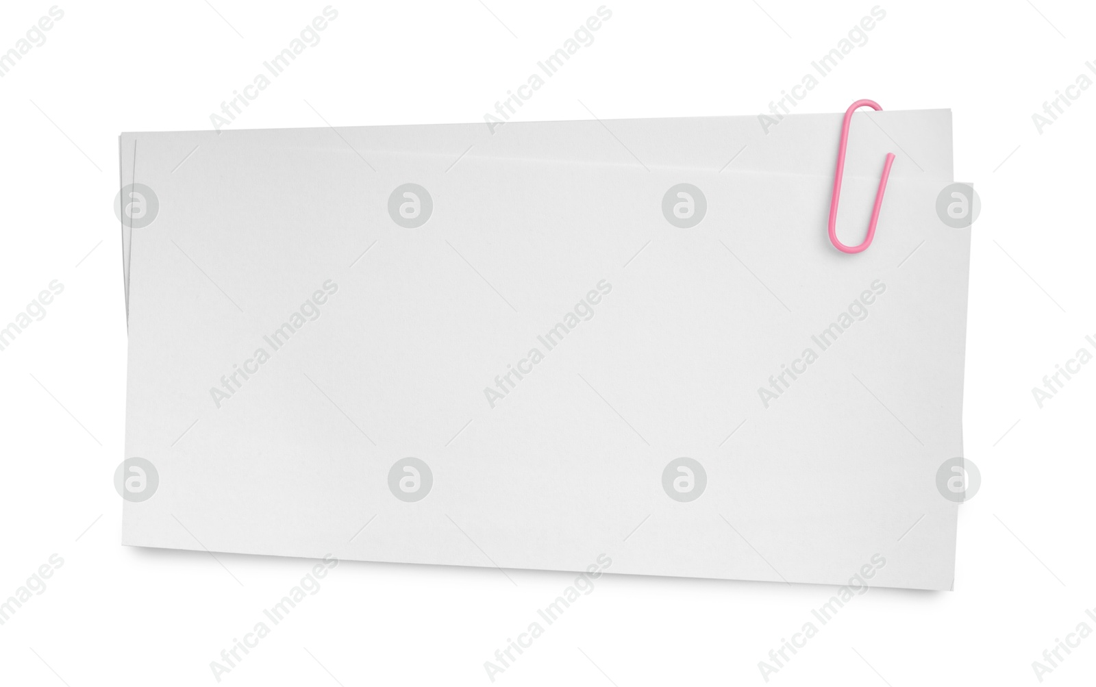 Photo of Blank paper sheet attached with clip isolated on white, top view