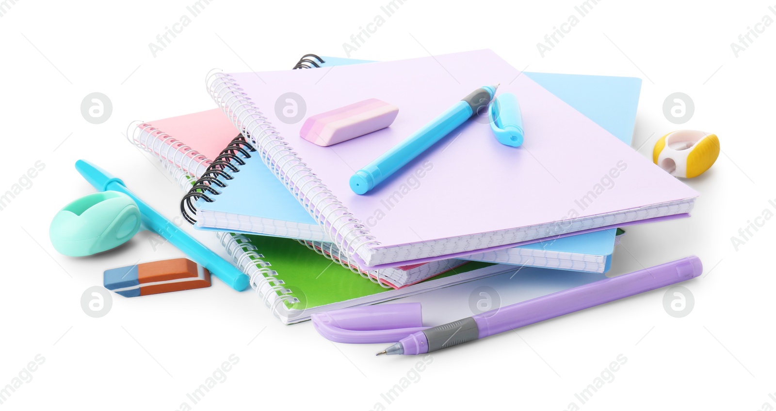 Photo of Doing homework. Notebooks and other different stationery on white background