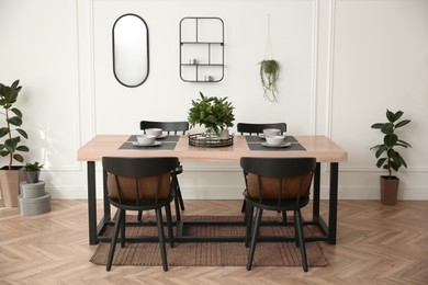 Image of Dining room interior with elements in mocha mousse shade. Trendy color of 2025 year