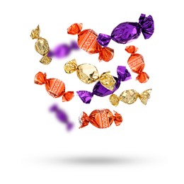 Image of Candies in bright wrappers falling on white background