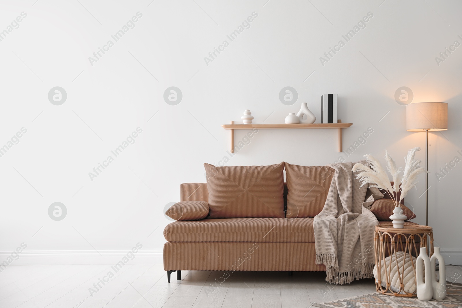 Image of Sofa in mocha mousse shade indoors. Interior with trendy color of 2025 year