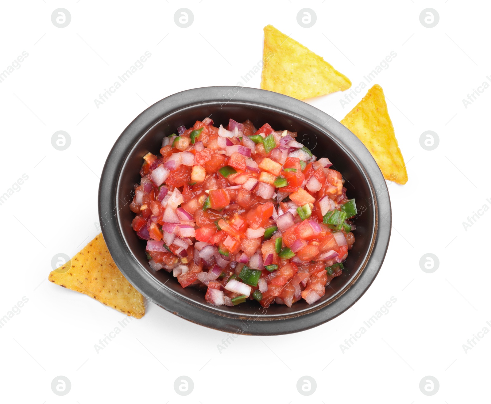 Photo of Delicious salsa in bowl and nacho chips isolated on white, top view